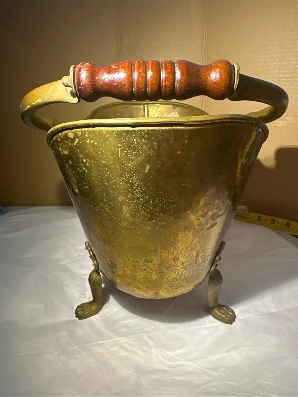 Solid copper and brass coal handle lions head footed made in Ireland 12”x13”x9”